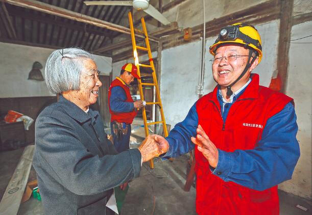 時代楷?！泵鎸γ?錢海軍：黎明同志步履不停 點(diǎn)亮萬家燈火